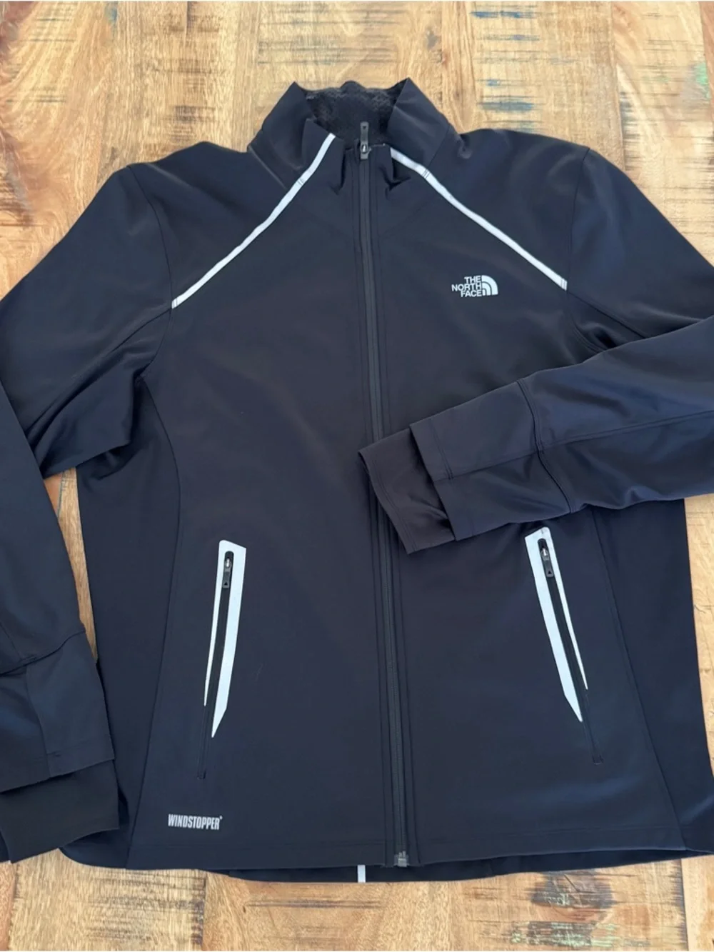 The North Face Men’s Black Lightweight Windstopper Jacket with Reflective Trim